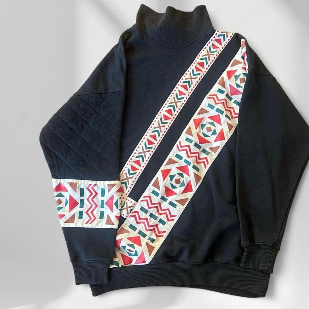 Black Turtleneck Sweater with Geometric Accent
